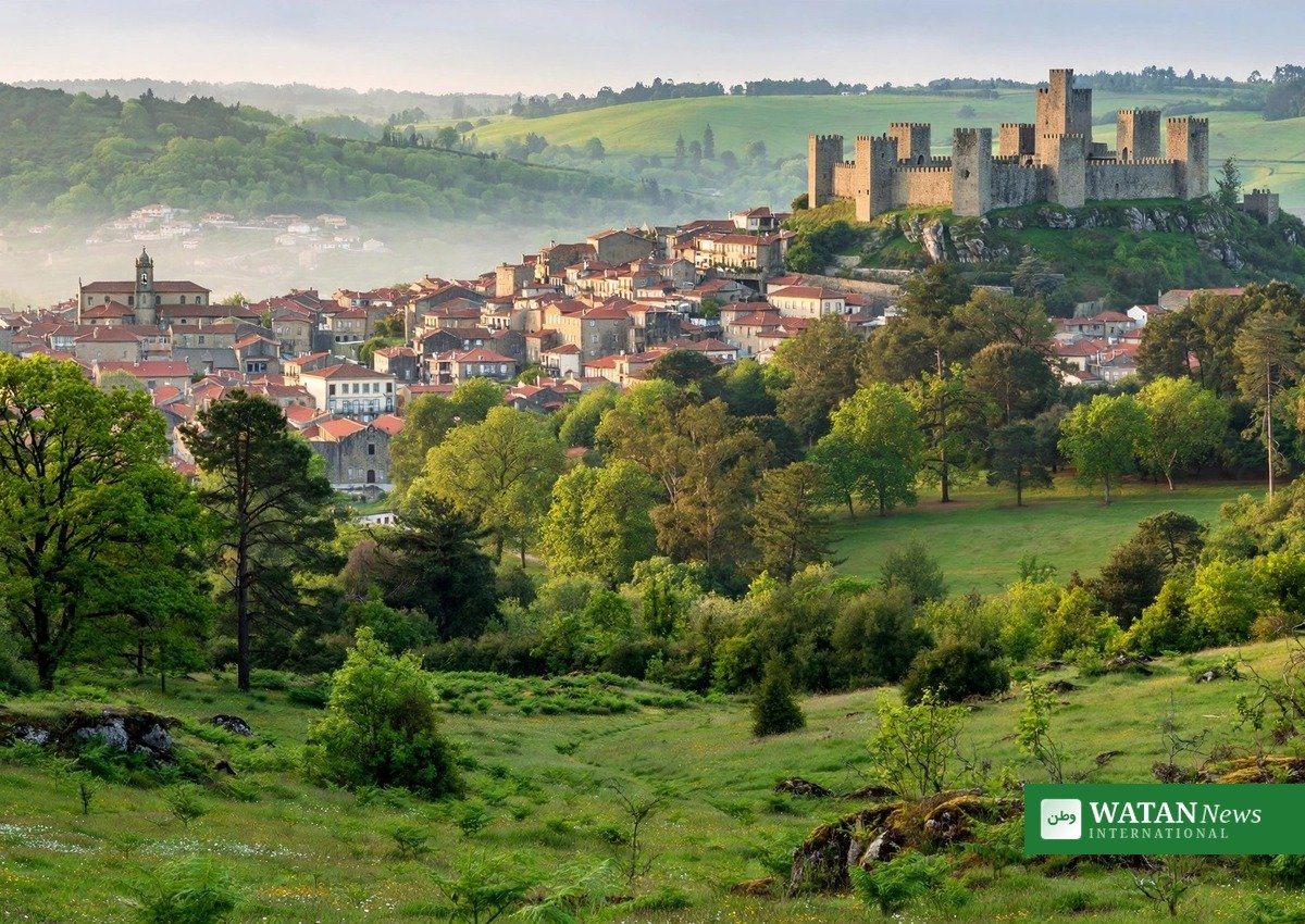 Guimarães castle and old town surrounded by green hills — the 2026 European Green Capital hosts the 2028 winners' announcement on 8 October