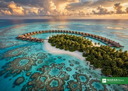 World best travel destinations - Maldives island aerial at golden hour