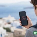 Greece social media ban under 15 — child with smartphone