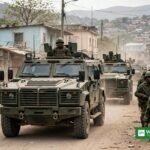 Salvadoran soldiers on patrol with armoured vehicles in Haiti