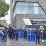 Turkish riot police with shields outside the Halk TV headquarters in Istanbul during the October 14, 2026 police raid.