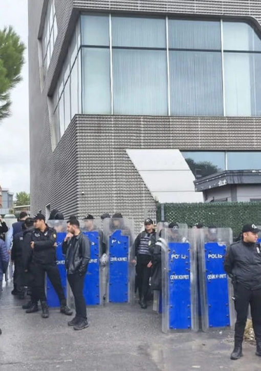 Turkish riot police with shields outside the Halk TV headquarters in Istanbul during the October 14, 2026 police raid.