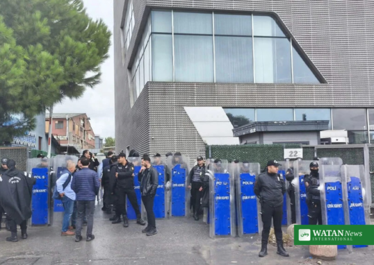 Turkish riot police with shields outside the Halk TV headquarters in Istanbul during the October 14, 2026 police raid.