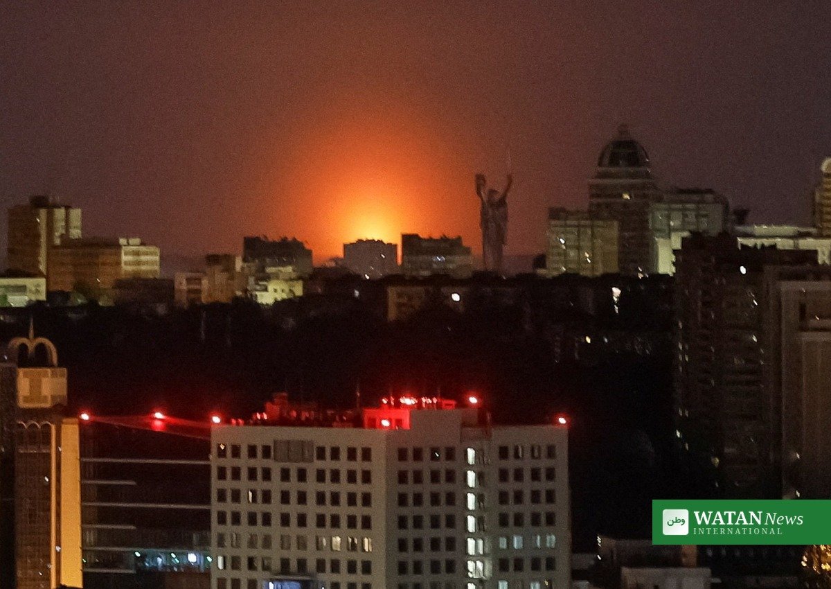 Smoke rising from a damaged apartment building in Kyiv after a Russian missile strike