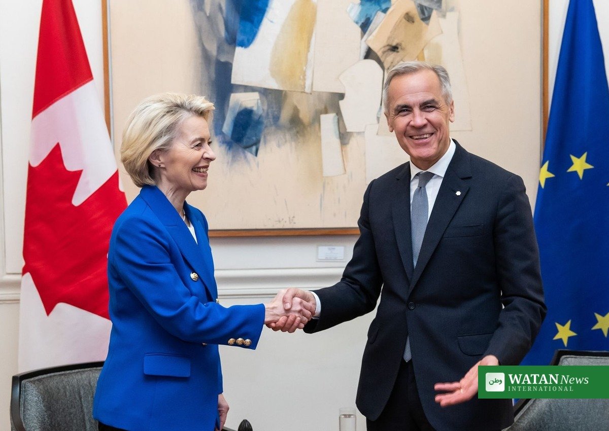 European Commission President Ursula von der Leyen shakes hands with Canadian Prime Minister Mark Carney