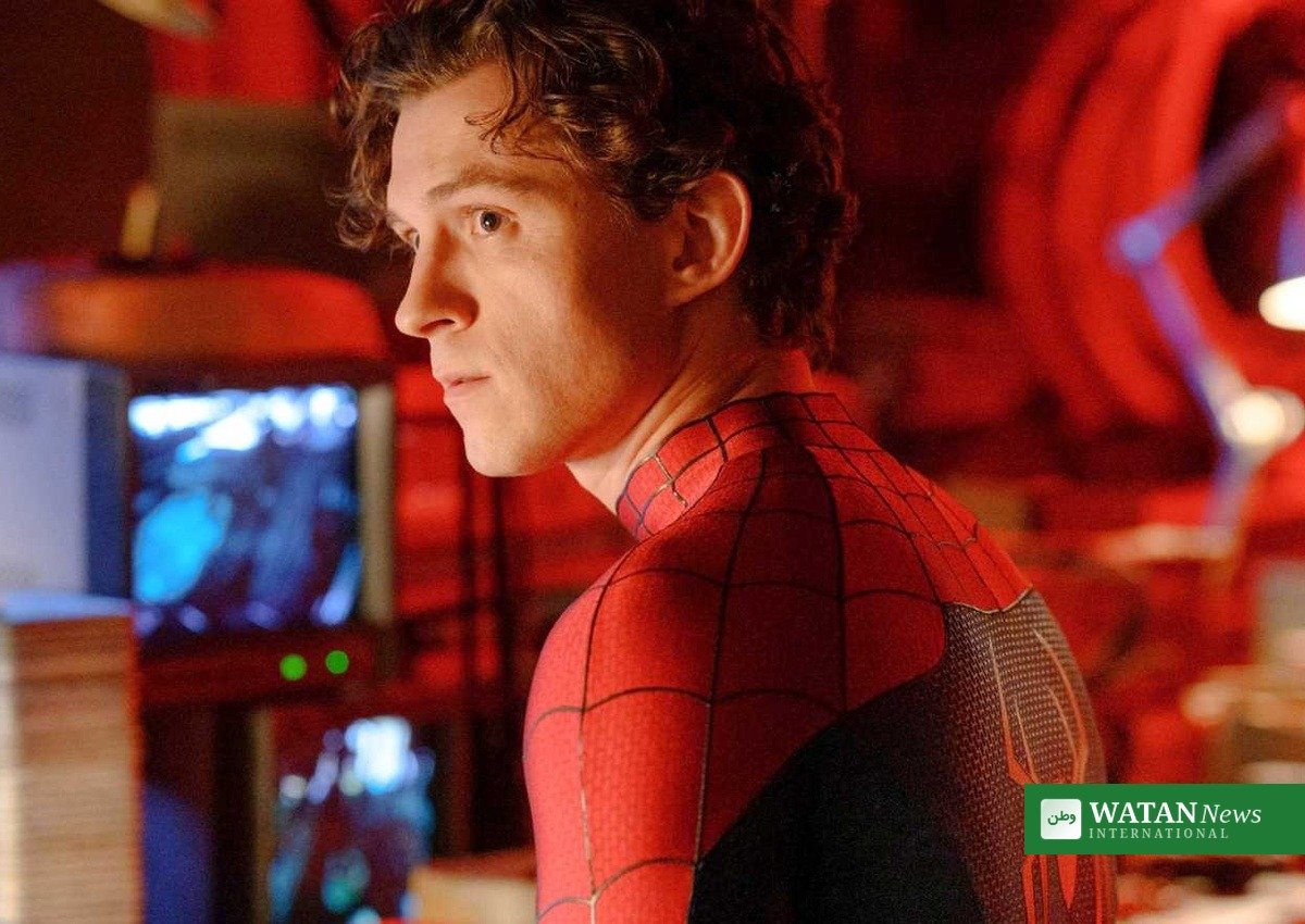 Tom Holland as Spider-Man Brand New Day at a work bench in the film