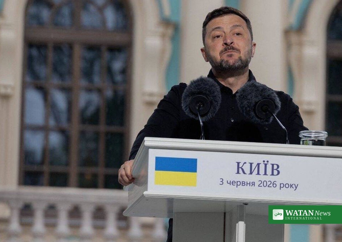 Volodymyr Zelensky speaks at a Kyiv podium after Russian strikes hit Ukraine's energy infrastructure