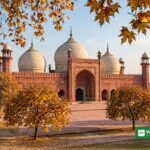 Lahore autumn — Badshahi Mosque with golden trees