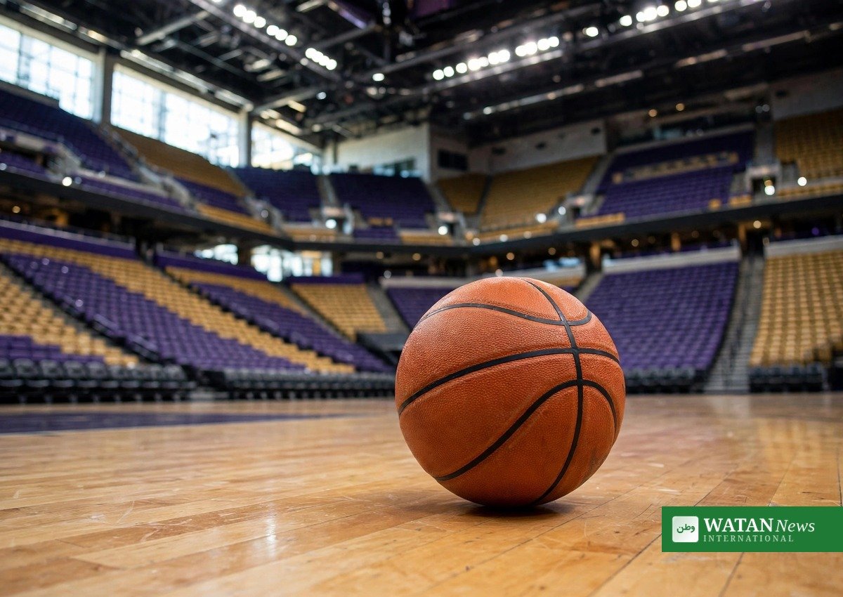 Lakers sale: basketball on court in arena with purple and gold seats