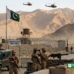 Pakistani soldiers guarding the Pakistan-Afghanistan border at Torkham as Pakistan rejects Taliban claims