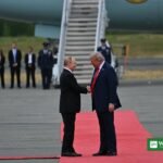 Putin plague call: Donald Trump and Vladimir Putin shake hands at the Anchorage summit in Alaska