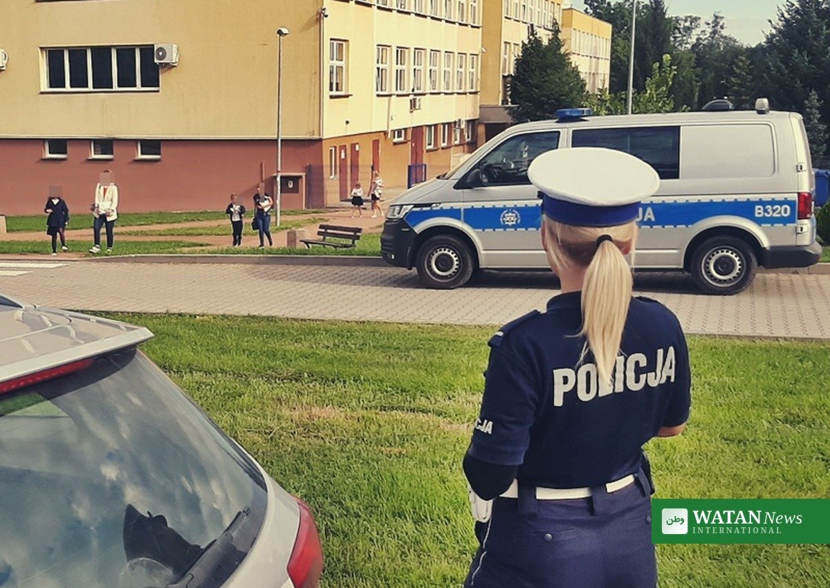Poland school attack: police officers outside the vocational school in Ostroleka after the machete attack