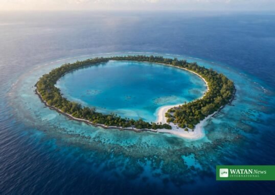 Aerial view of a Pacific coral atoll with turquoise lagoon — Pacific Resilience Facility climate fund