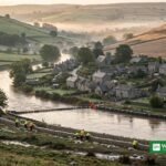 Volunteers building a sandbag flood defence along a British river — Flood and Drought Resilience Taskforce