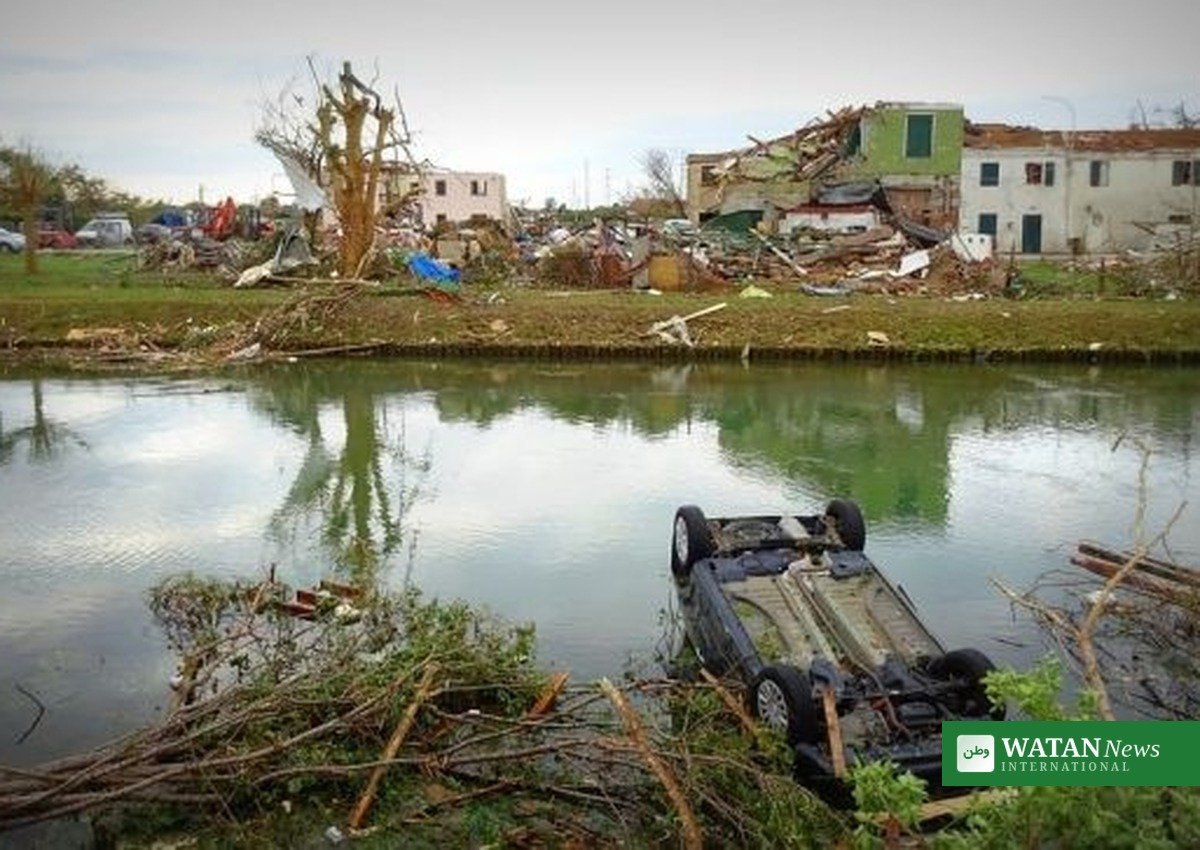 Tornado aftermath with overturned car and damaged buildings — Sicily tornado Marsala