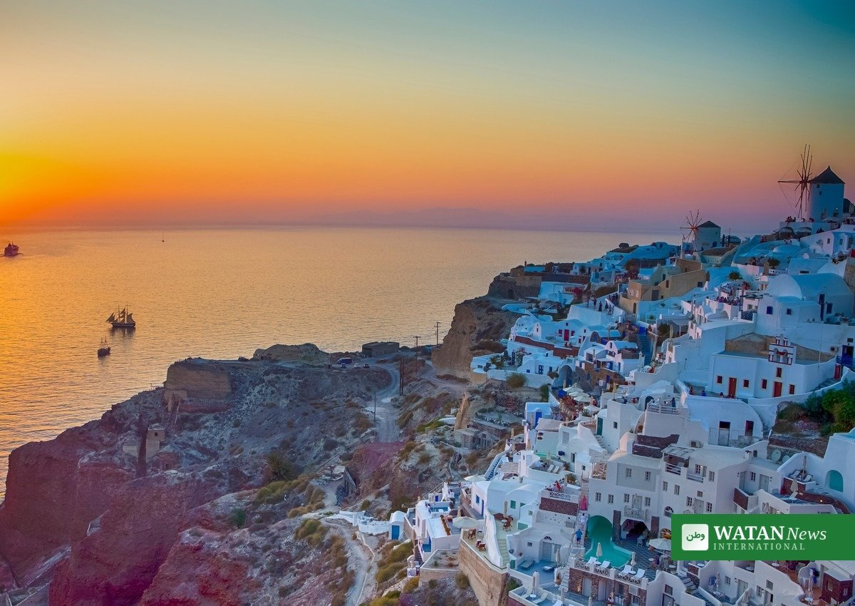 Santorini solnedgang over calderaen