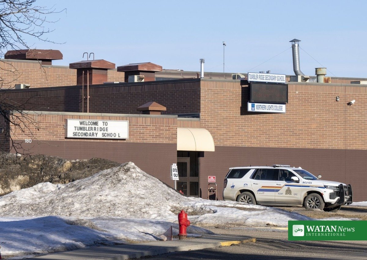 Tumbler Ridge Secondary School with RCMP police vehicle after the February 2026 school shooting
