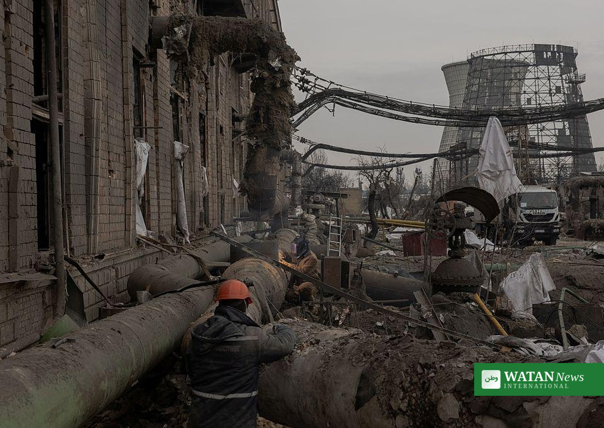 Firefighters at a damaged building in Kyiv after the overnight Russian strikes on Ukraine's energy infrastructure