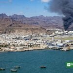 Smoke rising near Aden airport after Houthi Aden missile strike on Badr Camp